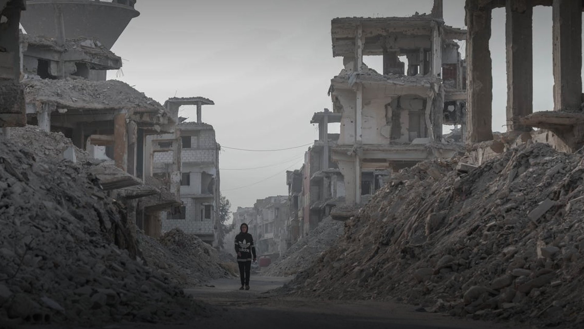 Syria's Reconstruction Efforts Face International Sanctions as Political Transition Stalls
